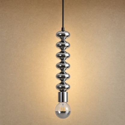 Kavlin pendant light in polished chrome with half-mirror globe | Wickleigh