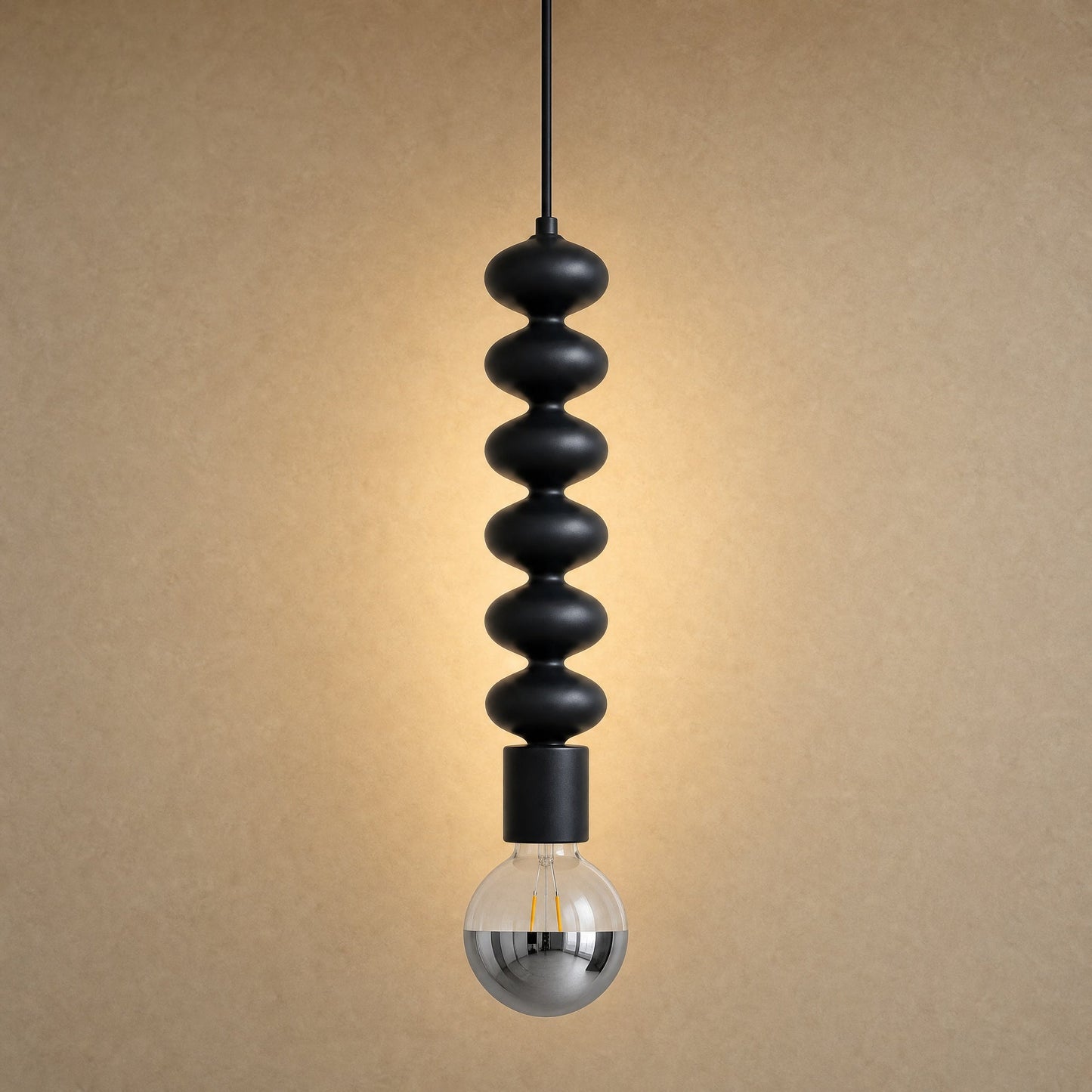 Kavlin pendant light in matte black with half-mirror globe | Wickleigh