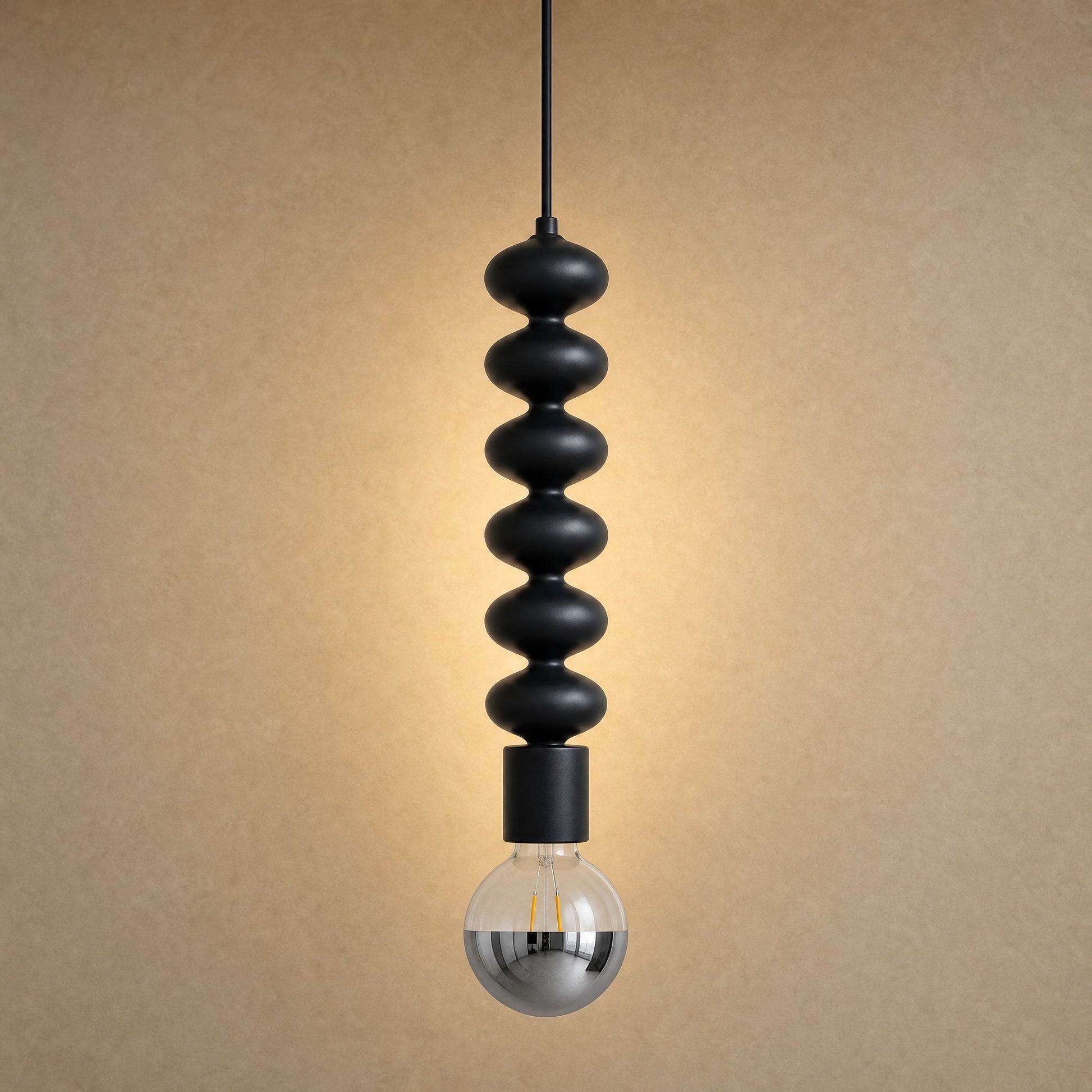 Kavlin pendant light in matte black with half-mirror globe | Wickleigh