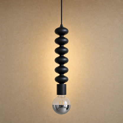 Kavlin pendant light in matte black with half-mirror globe | Wickleigh