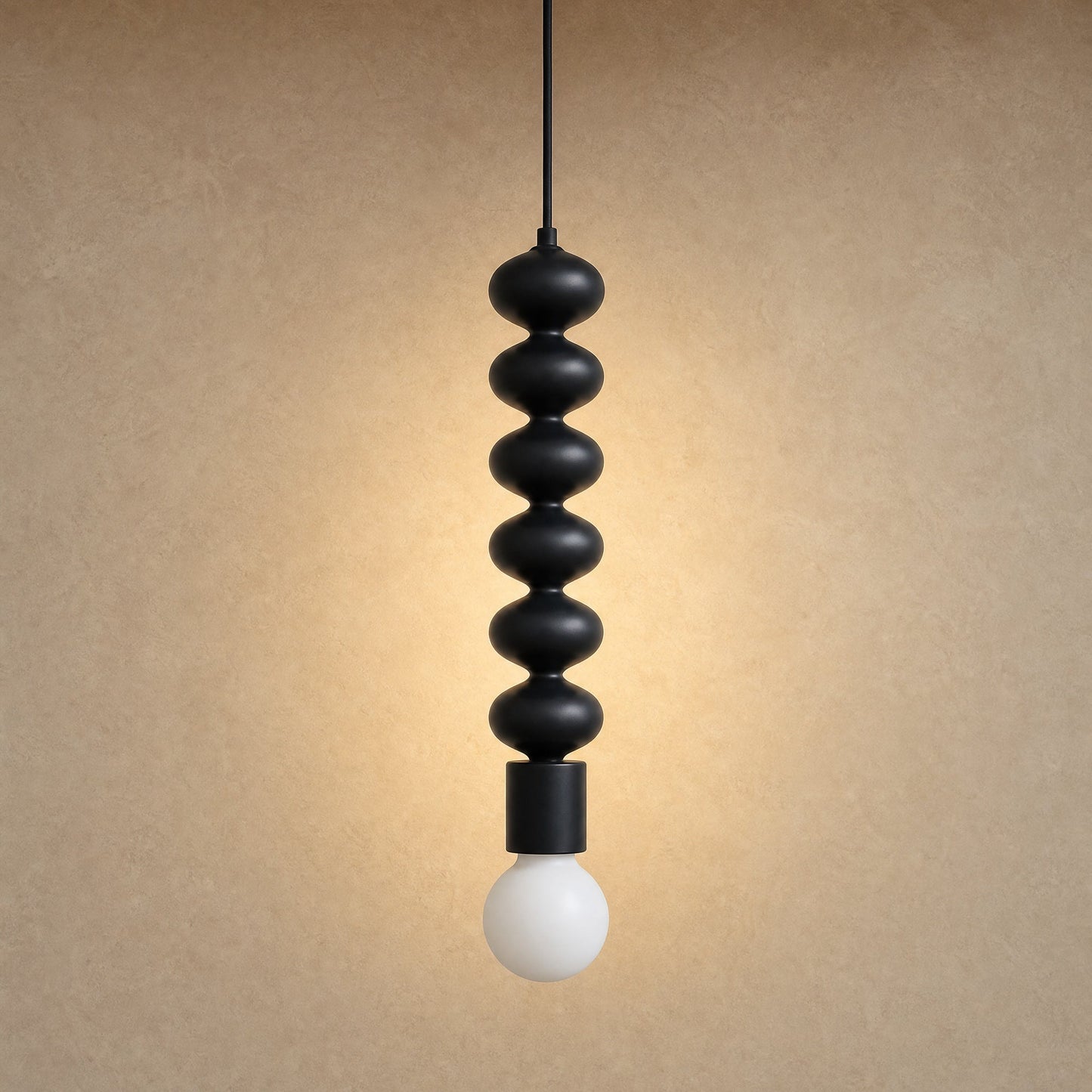 Kavlin black metal pendant light, six-bead column in matte black with opal globe | Wickleigh