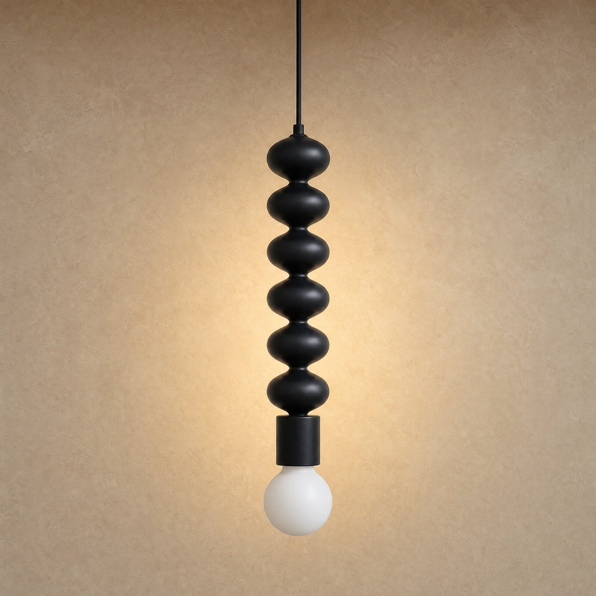 Kavlin black metal pendant light, six-bead column in matte black with opal globe | Wickleigh