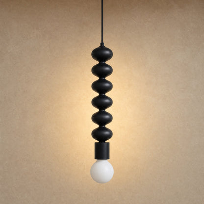 Kavlin black metal pendant light, six-bead column in matte black with opal globe | Wickleigh