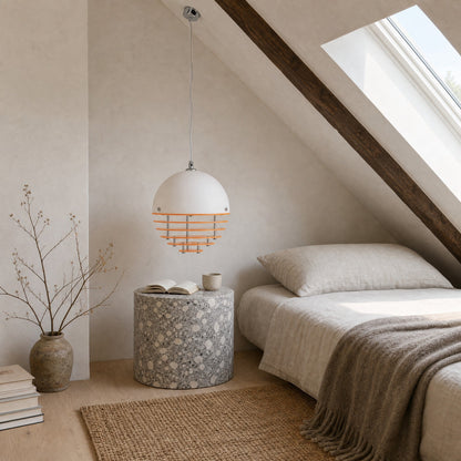 Fenwyn orange pendant light used as a bedside light in an attic bedroom, granito table | Wickleigh