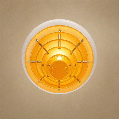 Fenwyn orange pendant light seen from below, six concentric amber discs and E27 bulb | Wickleigh