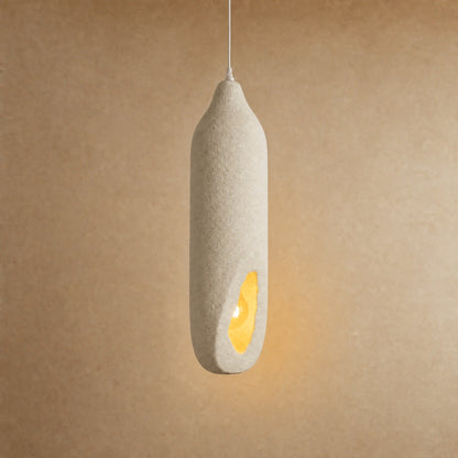 Korven pendant light switched on, an amber ember glowing within the ivory column | Wickleigh