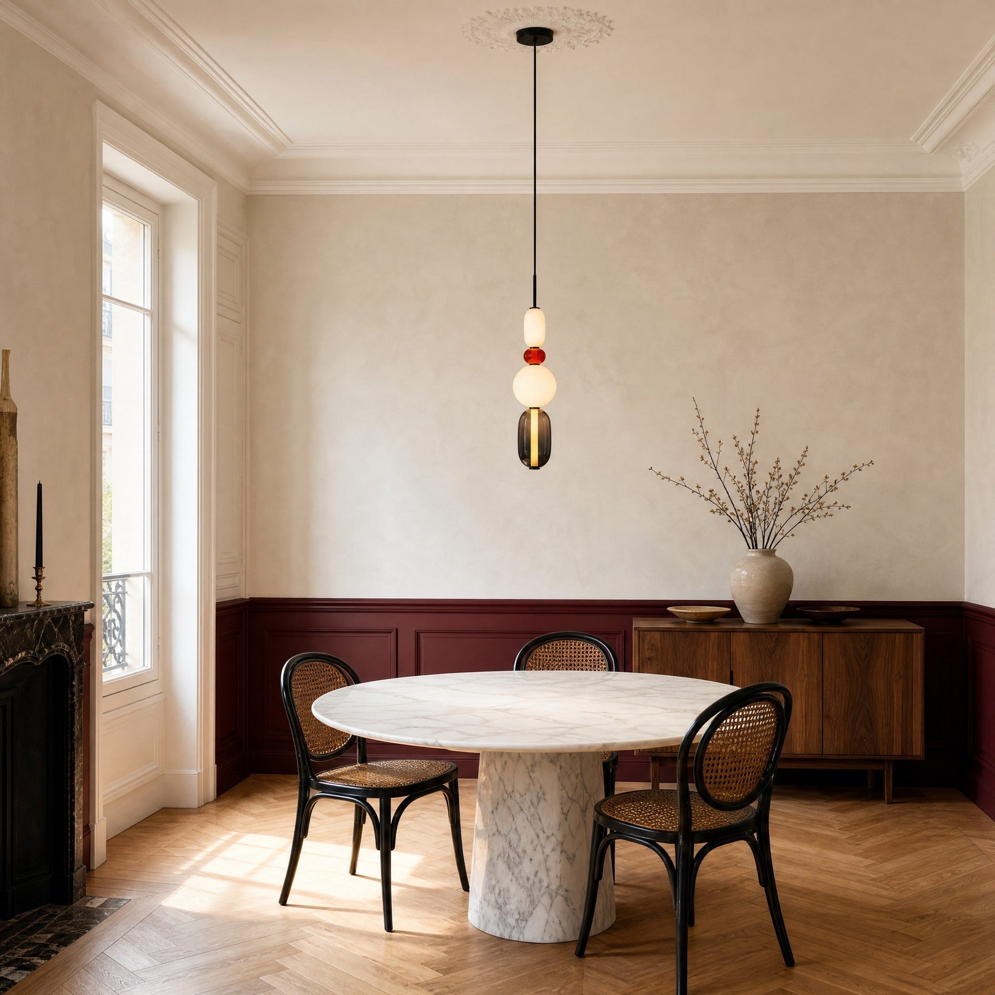 Aslin coloured glass pendant light, four beads, above an art deco marble round table | Wickleigh
