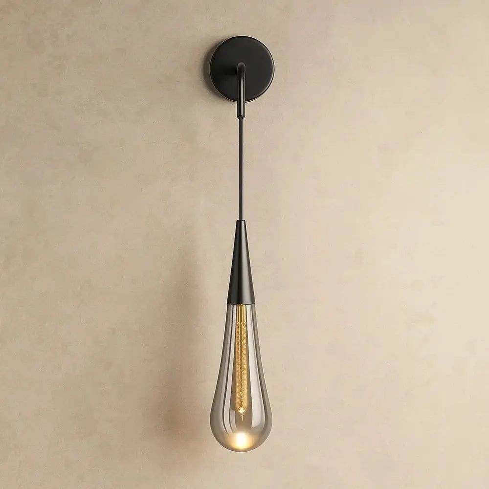 Ulika golden droplet crystal wall light, black | Wickleigh