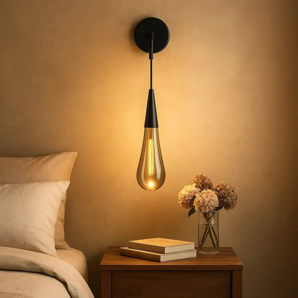 Ulika golden droplet crystal wall light | Wickleigh