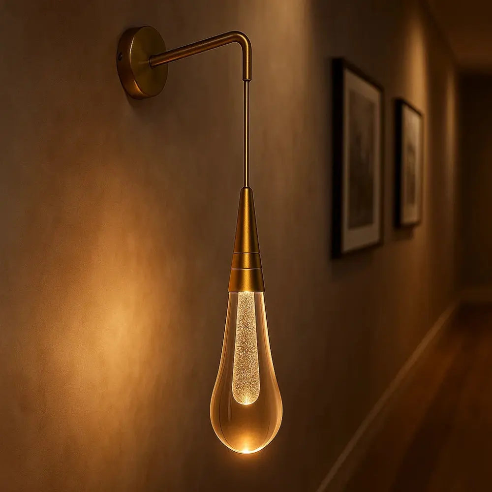 Ulika golden droplet crystal wall light | Wickleigh