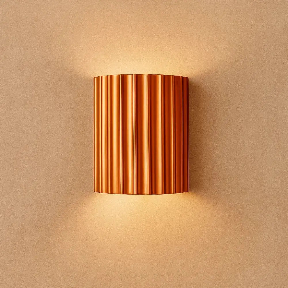 Nelra sculpted resin wall light, orange | Wickleigh